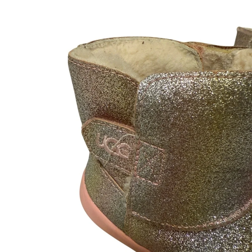 UGG’s Sparkly Gold and Pink Boots.